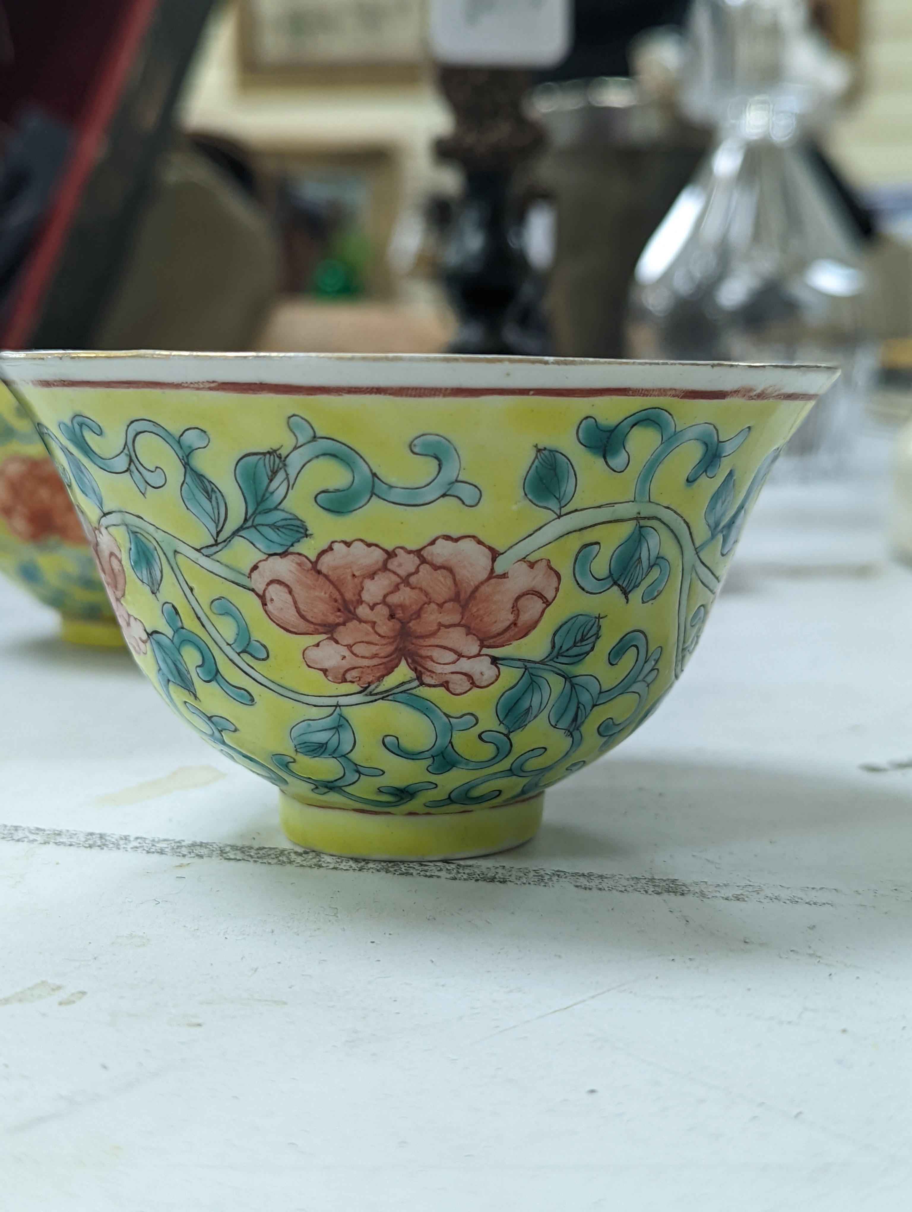 A group of Chinese porcelain, 19th /20th century, to include a pair of yellow ground bowls, 10.8 cm diameter, a blue and white vase, Xuande mark, a similar bowl and vase, and a champleve enamel bronze koro and cover